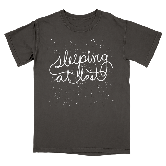 Black t-shirt with 'Sleeping at last' text on a white background