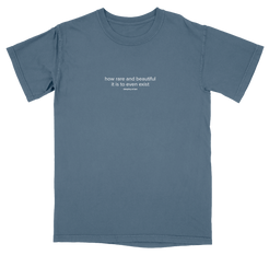 Blue t-shirt with white text on a white background
