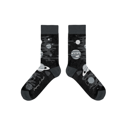 Black socks with space-themed designs on a white background