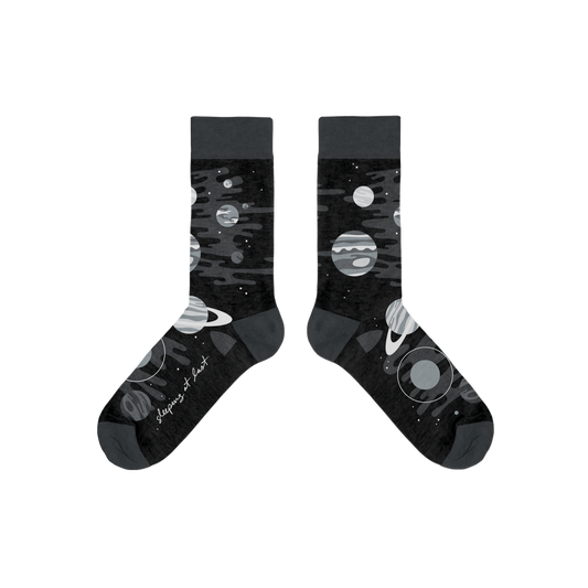 Black socks with space-themed designs on a white background